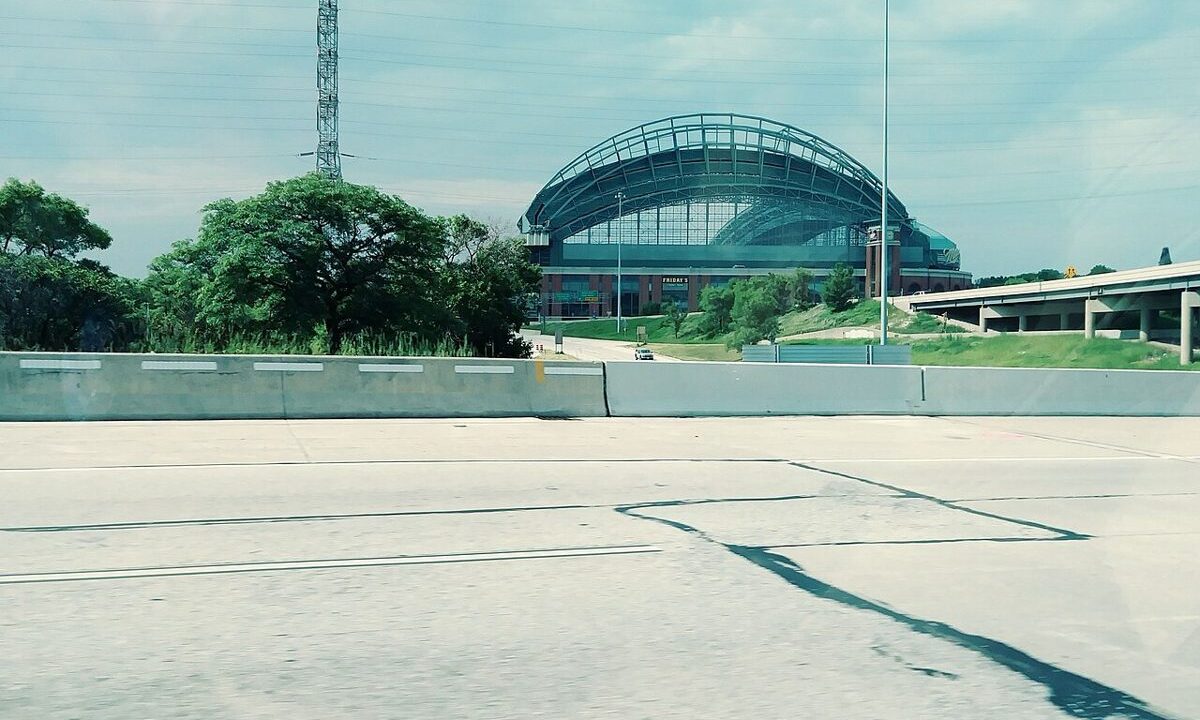 Baseball stadium exterior under a bright sky