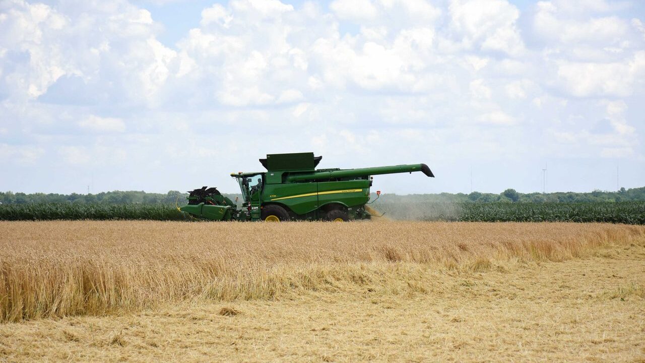 Combine harvester harvesting wheat in an Indiana field for World Food Day 2026